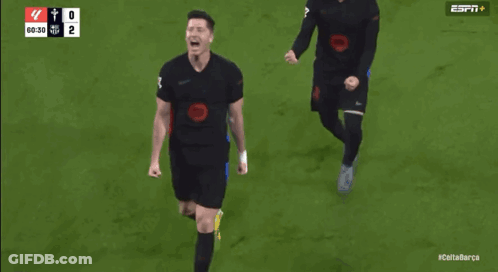 Two Soccer Players On A Field With The Espn Logo On The Bottom GIF