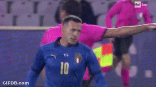 Two Soccer Players On A Field With The Number 4 On Their Shirt GIF