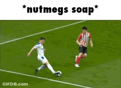 Two Soccer Players On A Field With The Words " Nutmegs Soap " Below Them GIF