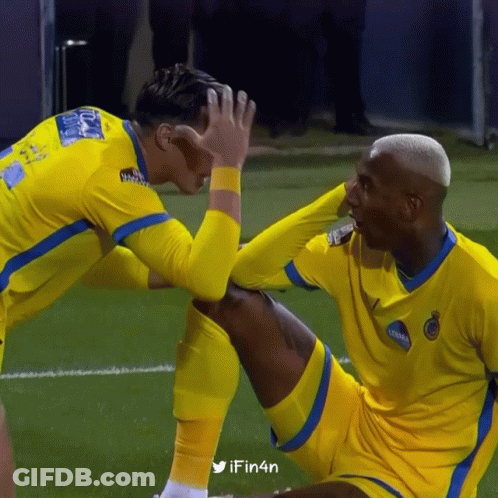 Two Soccer Players On Field GIF