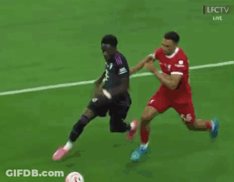 Two Soccer Players On Field Sponsored By LFCTV GIF