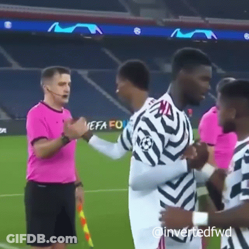 Two Soccer Players On Field With Crowd GIF