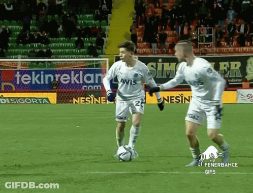 Two Soccer Players On Field With Tekinreklam Sign GIF