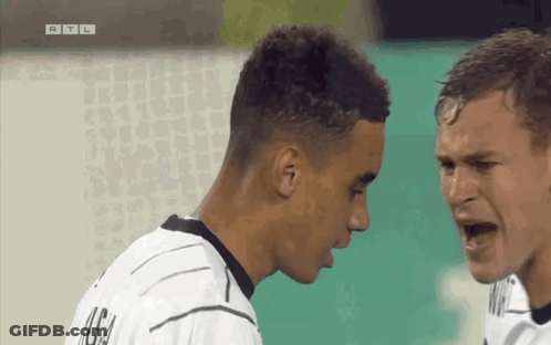 Two Soccer Players One In Mora Jersey GIF