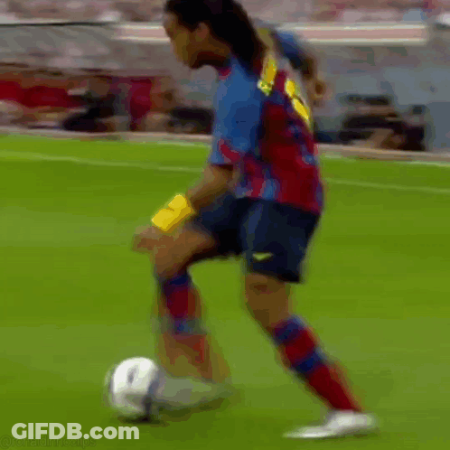 Two Soccer Players, One In Red Socks GIF