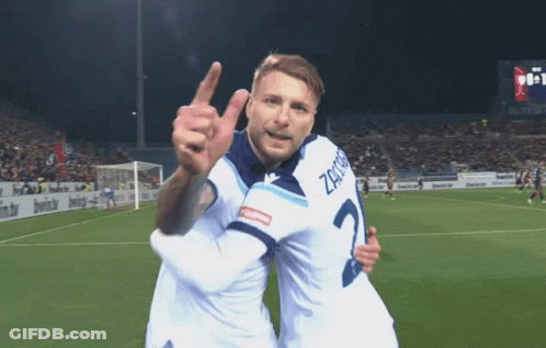 Two Soccer Players One Of Whom Has The Number 2 On His Shirt GIF