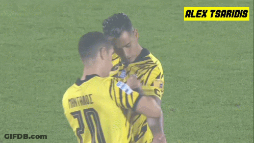 Two Soccer Players One Of Whom Has The Number 20 On Their Jersey GIF