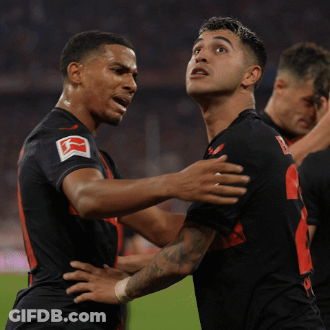 Two Soccer Players One Of Whom Has The Number 8 On His Jersey GIF