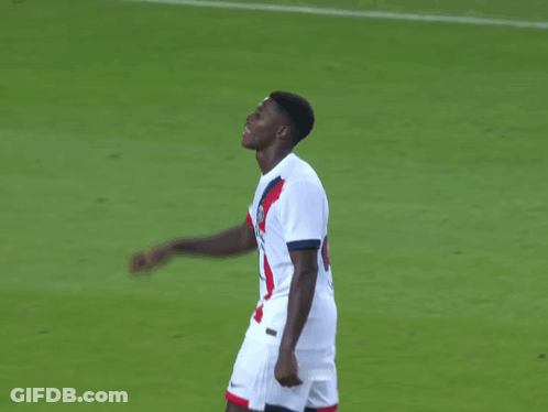Two Soccer Players One Of Whom Has The Number 9 On His Jersey GIF