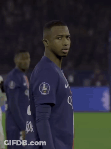 Two Soccer Players One Wearing A Qatar Airways Shirt GIF
