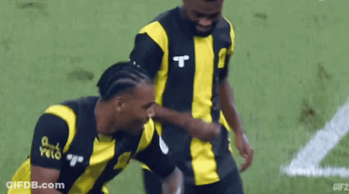 Two Soccer Players One With Letter T GIF
