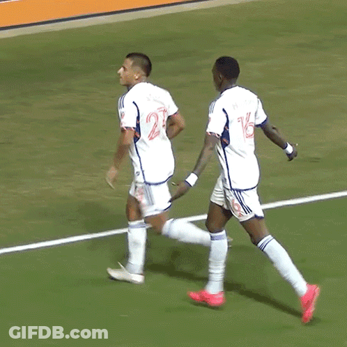Two Soccer Players, One With Number 14 GIF