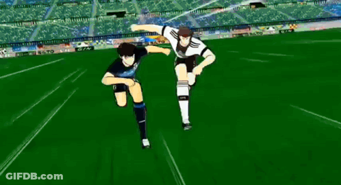 Two Soccer Players Running On Soccer Field GIF