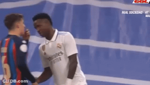Two Soccer Players Shaking Hands GIF