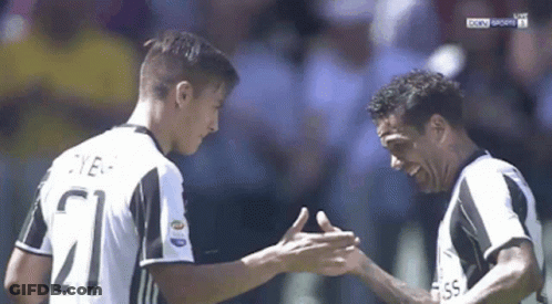 Two Soccer Players Shaking Hands Number 21 GIF
