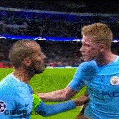 Two Soccer Players Shaking Hands On Field GIF