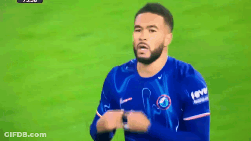 Two Soccer Players Shaking Hands With One Wearing A Fever Shirt GIF