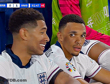 Two Soccer Players Sitting With Scoreboard Eng 92:47 GIF