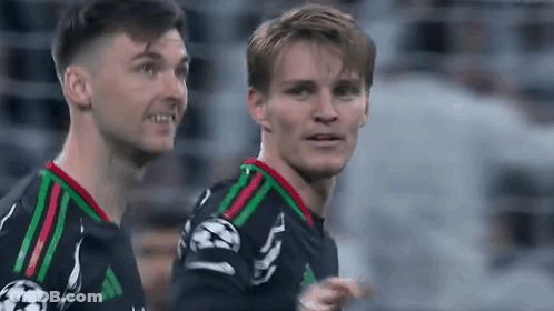 Two Soccer Players Standing And Smiling GIF