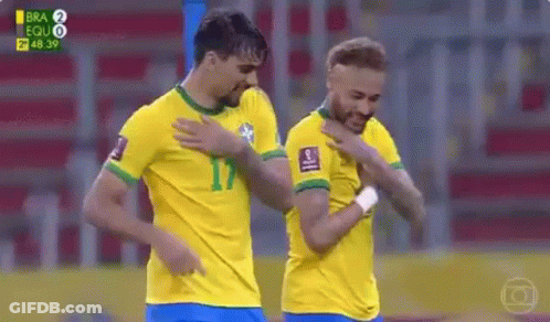 Two Soccer Players Standing Next To Each Other GIF