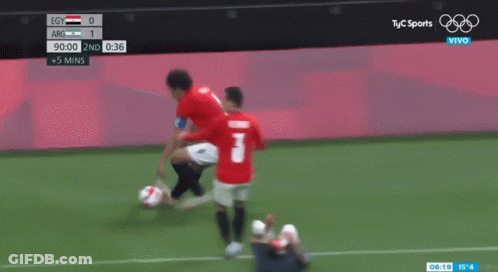 Two Soccer Players Standing On A Field With A Tbc Sports Logo In The Background GIF