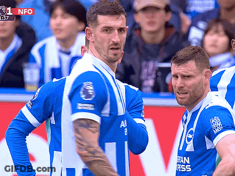 Two Soccer Players Standing On Field Number 1 GIF