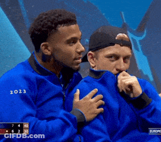 Two Soccer Players Standing With Nike Logo GIF