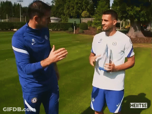 Two Soccer Players Talking With Heitse GIF
