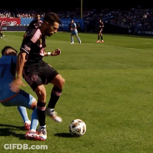 Two Soccer Players Under CBS Banner GIF