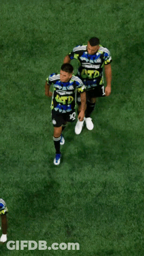 Two Soccer Players Wearing ATD Shirts GIF