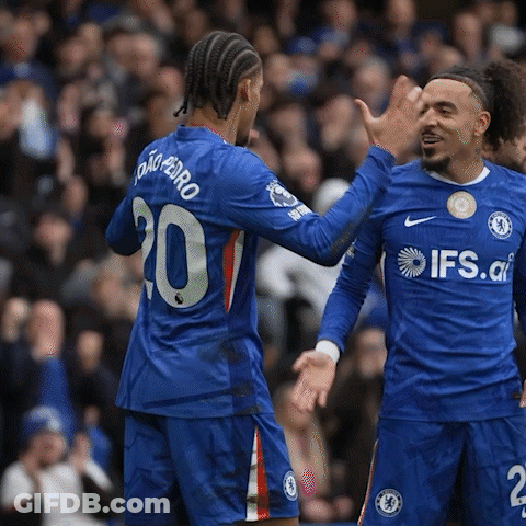 Two Soccer Players Wearing Blue Jerseys With Ifs.co On Them GIF