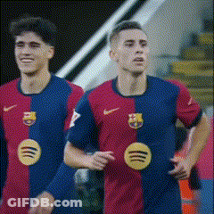 Two Soccer Players Wearing Red And Blue Jerseys With Spotify Logos On Them GIF
