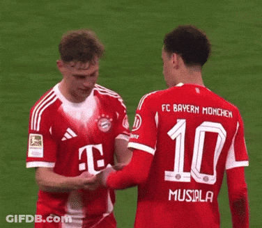 Two Soccer Players Wearing Red Jerseys With The Number 10 On The Back GIF