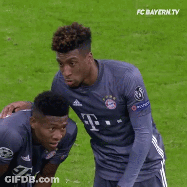 Two Soccer Players Wearing T-Mobile Jerseys Are On The Field GIF