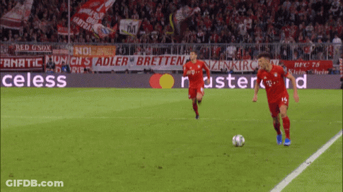 Two Soccer Players With Celess Banner GIF