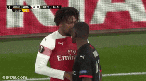 Two Soccer Players With Fly Emirates Jerseys GIF