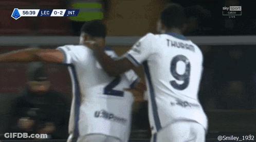 Two Soccer Players With The Number 9 On Their Backs GIF