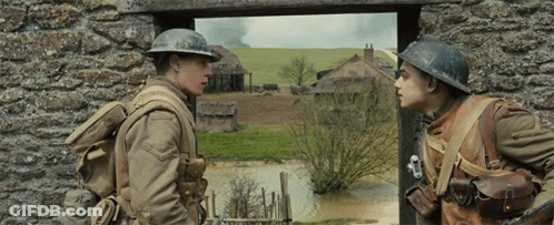 Two Soldiers Standing And Talking GIF
