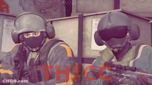 Two Soldiers Are Standing Next To Each Other With The Word Thigh Written In Red GIF