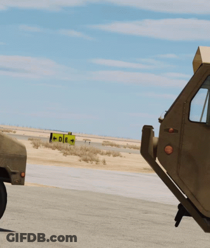 Two Soldiers Standing By Jeep GIF