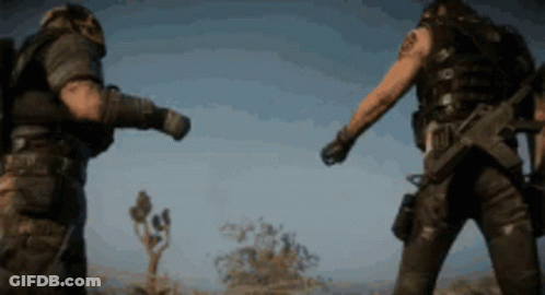 Two Soldiers Standing In Field GIF