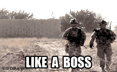 Two Soldiers Walking In A Field With The Words Like A Boss On The Bottom GIF