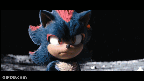 Two Sonic The Hedgehogs Are Standing Next To Each Other In Front Of A Glowing Light . GIF