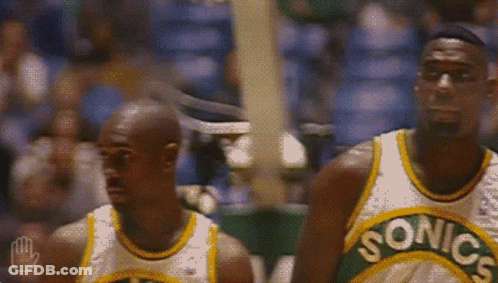 Two Sonics Basketball Players In Front Of Crowd GIF
