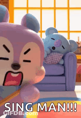 Two Stuffed Animals Are Sitting On A Couch And One Is Yawning . GIF