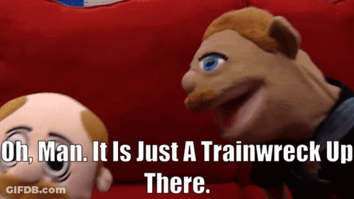 Two Stuffed Animals Are Sitting On A Red Couch And One Of Them Says Oh Man It Is Just A Trainwreck Up There GIF
