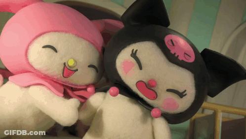Two Stuffed Animals Are Standing Next To Each Other And One Has A Smiley Face GIF