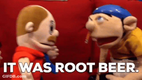 Two Stuffed Animals Are Standing Next To Each Other And Talking . GIF