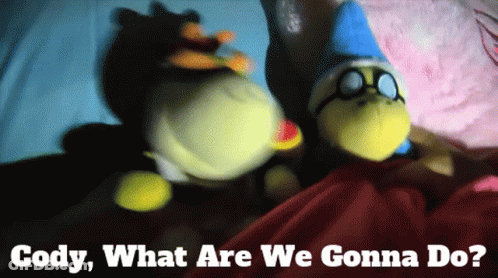 Two Stuffed Animals Laying On Bed With Cody What Are We Gonna Do GIF