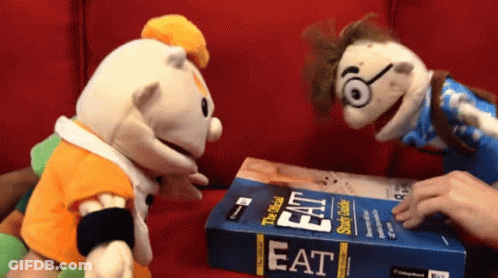 Two Stuffed Animals Looking At Eat Book GIF